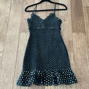 Likely size 0 black & gold short dress
